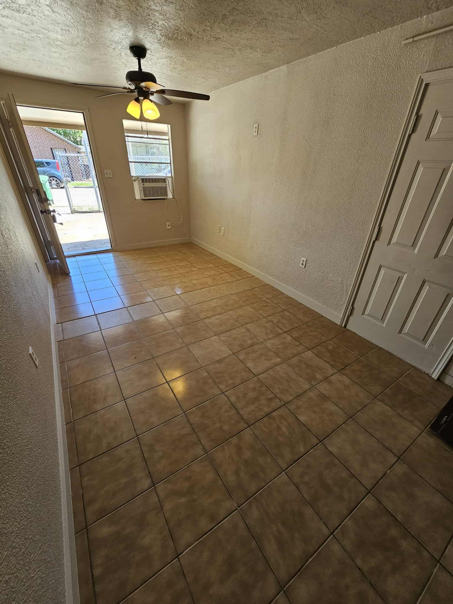 4115 Bering Street, Unit B Houston, TX 77003 - Photo 4 of 8 a view of an empty room and a window