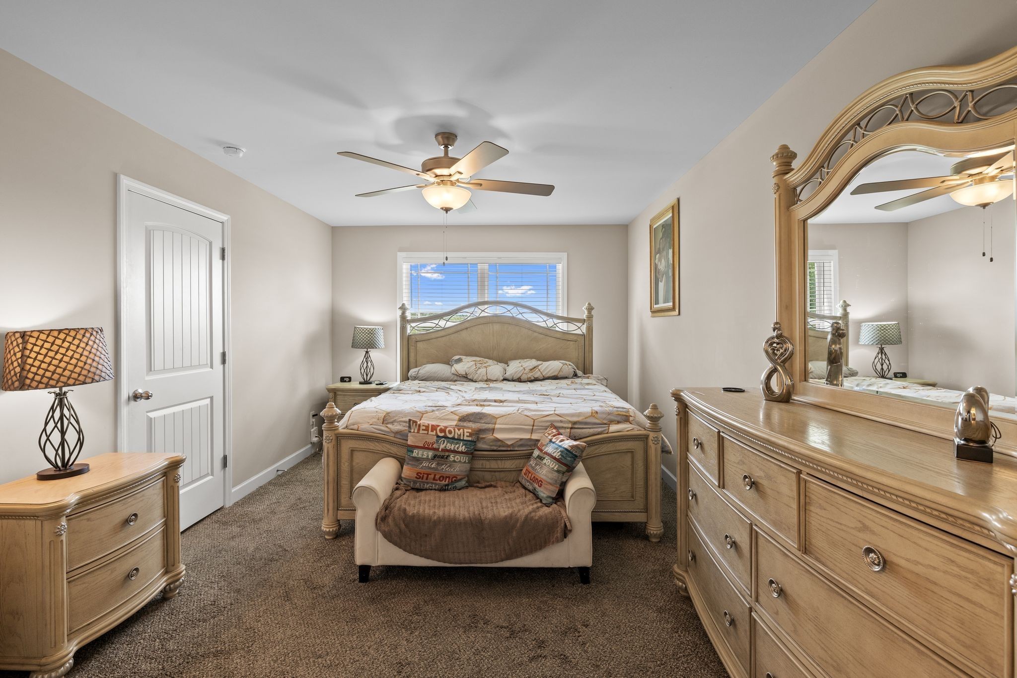 2511 Unionville Deason Road Bell Buckle, TN 37020 - Photo 12 of 20 a spacious bedroom with a bed and a chandelier