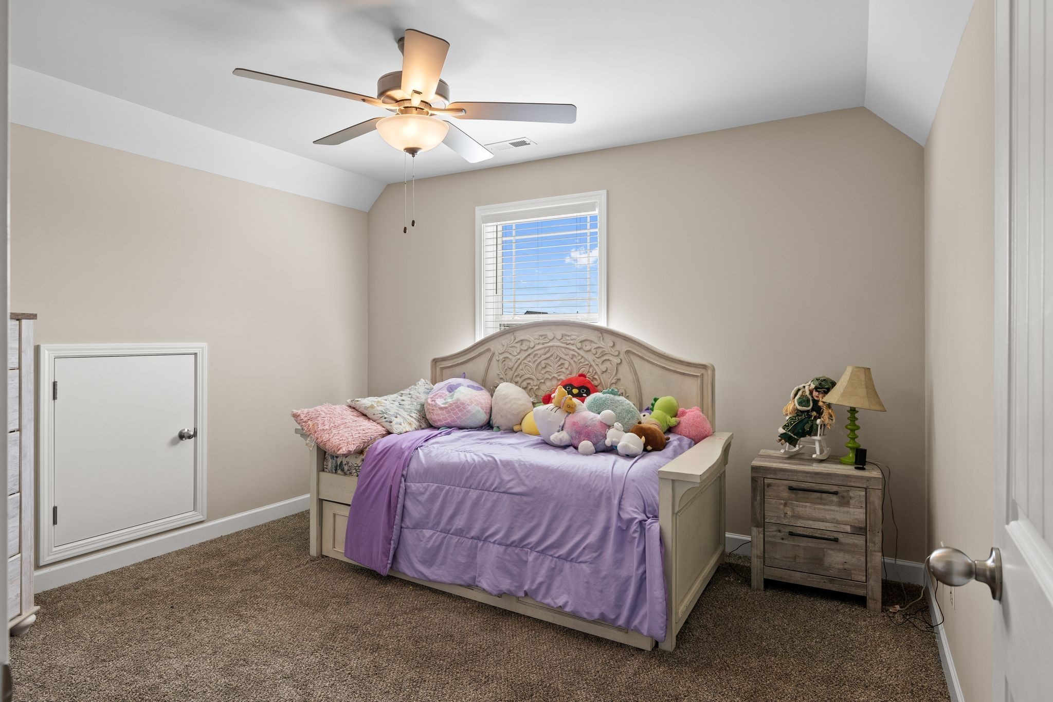 2511 Unionville Deason Road Bell Buckle, TN 37020 - Photo 15 of 20 a bedroom with a bed and a chandelier