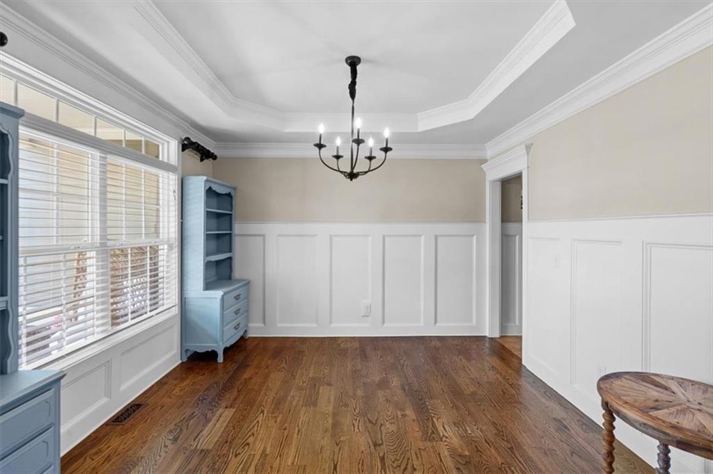 802 Double Branches Lane Dallas, GA 30132 - Photo 11 of 80 a view of empty room with wooden floor and fan