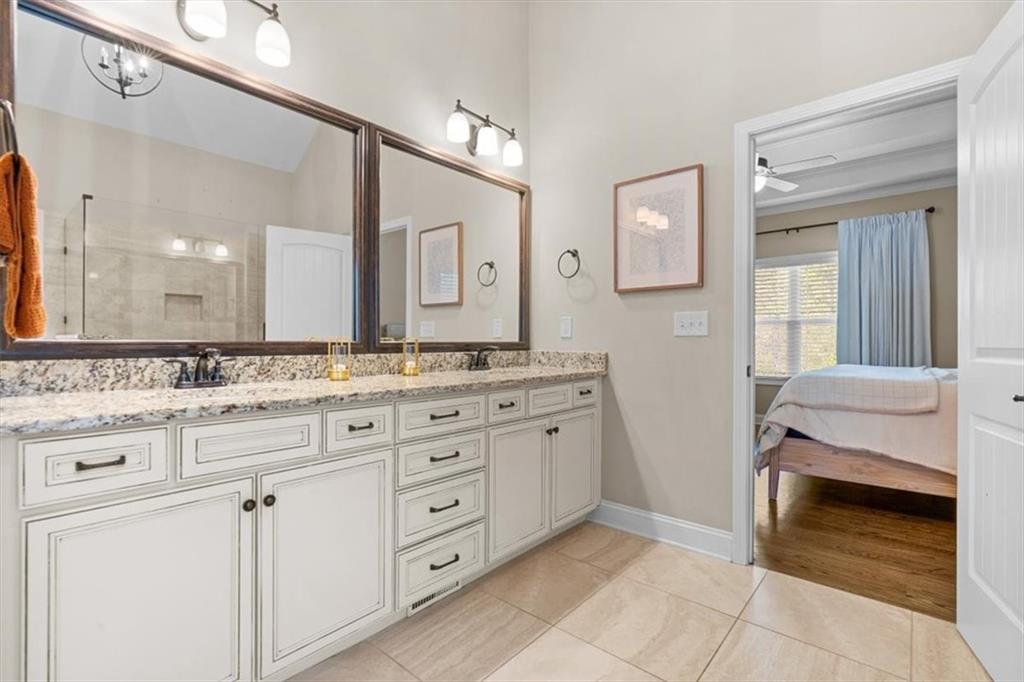 802 Double Branches Lane Dallas, GA 30132 - Photo 28 of 80 a bathroom with a sink and a mirror