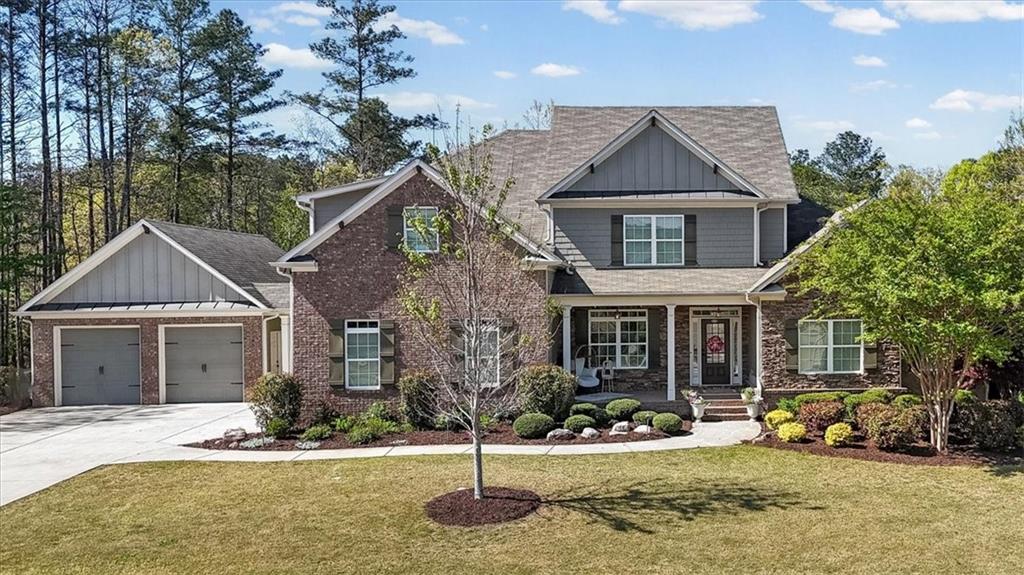 802 Double Branches Lane Dallas, GA 30132 - Photo 3 of 80 a front view of a house with garden and trees