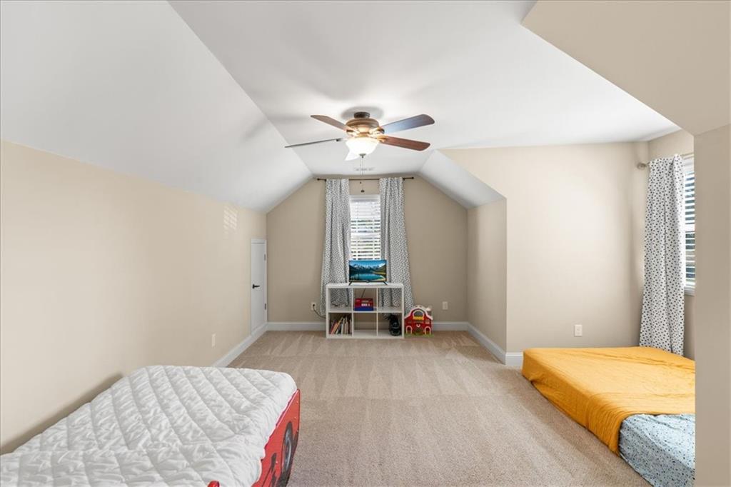 802 Double Branches Lane Dallas, GA 30132 - Photo 39 of 80 a living room with a bed furniture and a window