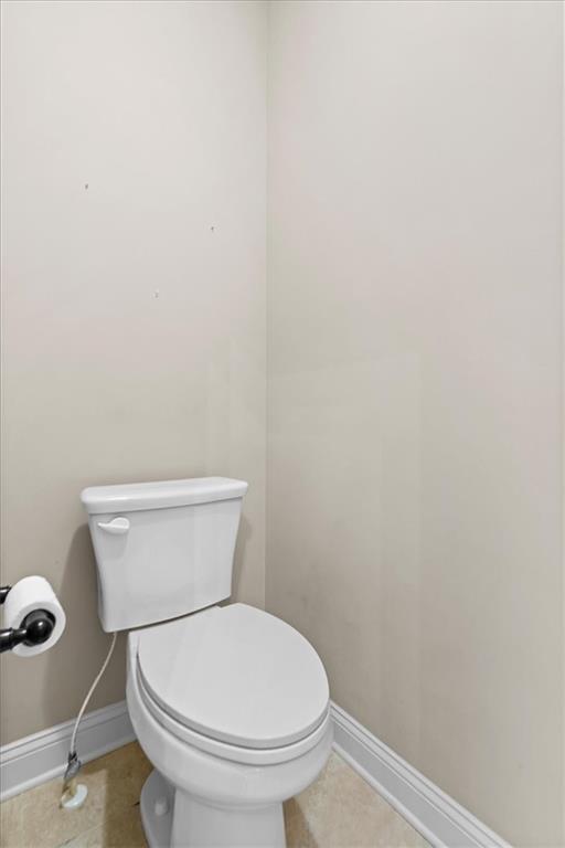802 Double Branches Lane Dallas, GA 30132 - Photo 42 of 80 a white toilet sitting next to a white wall