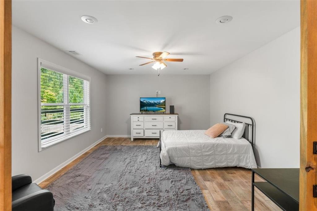 802 Double Branches Lane Dallas, GA 30132 - Photo 48 of 80 a bedroom with furniture and a window