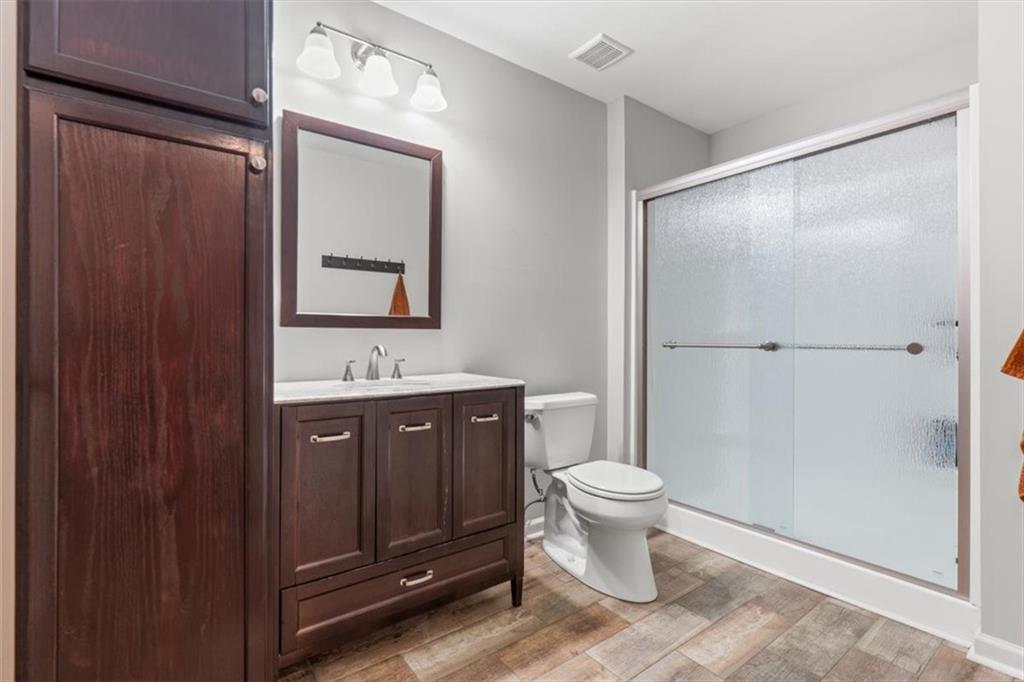 802 Double Branches Lane Dallas, GA 30132 - Photo 49 of 80 a bathroom with a toilet sink and mirror