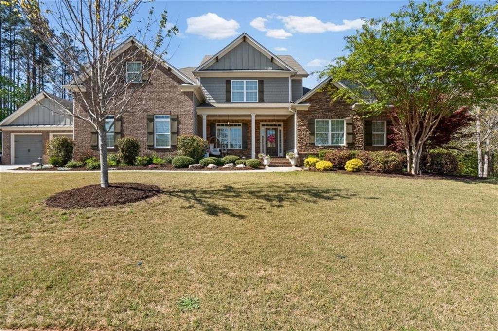 802 Double Branches Lane Dallas, GA 30132 - Photo 6 of 80 a front view of a house with a yard