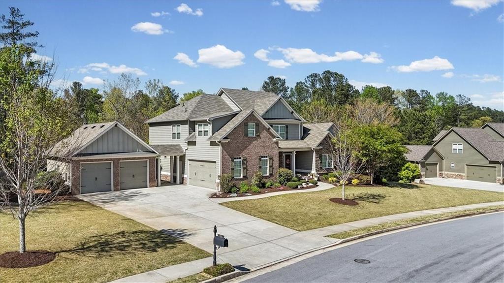 802 Double Branches Lane Dallas, GA 30132 - Photo 69 of 80 a front view of a house with garden and trees