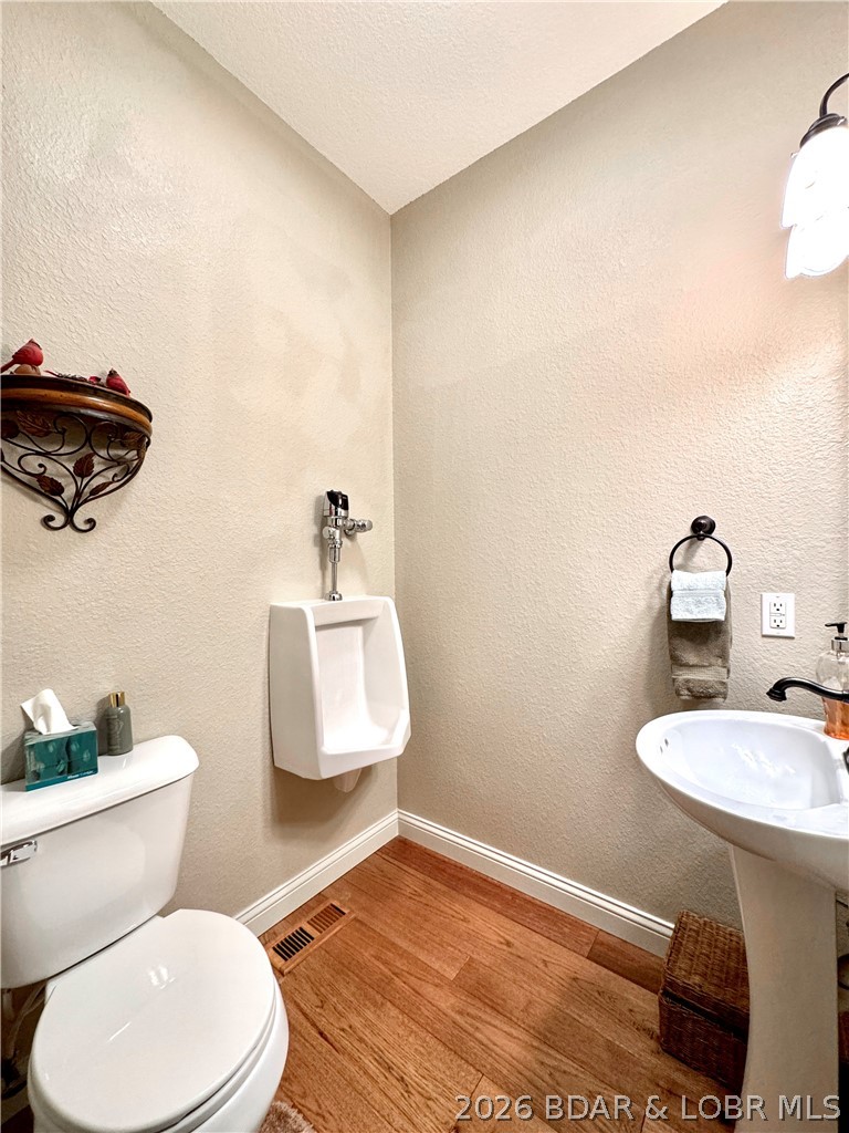 331 Hollow Oak Road Sunrise Beach, MO 65079 - Photo 34 of 66 Half bath on main level