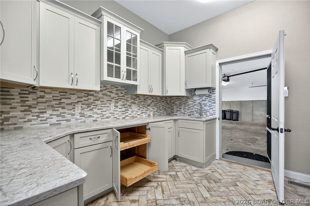 331 Hollow Oak Road Sunrise Beach, MO 65079 - Photo 37 of 66 Well designed Butler's Panty with custom cabinets