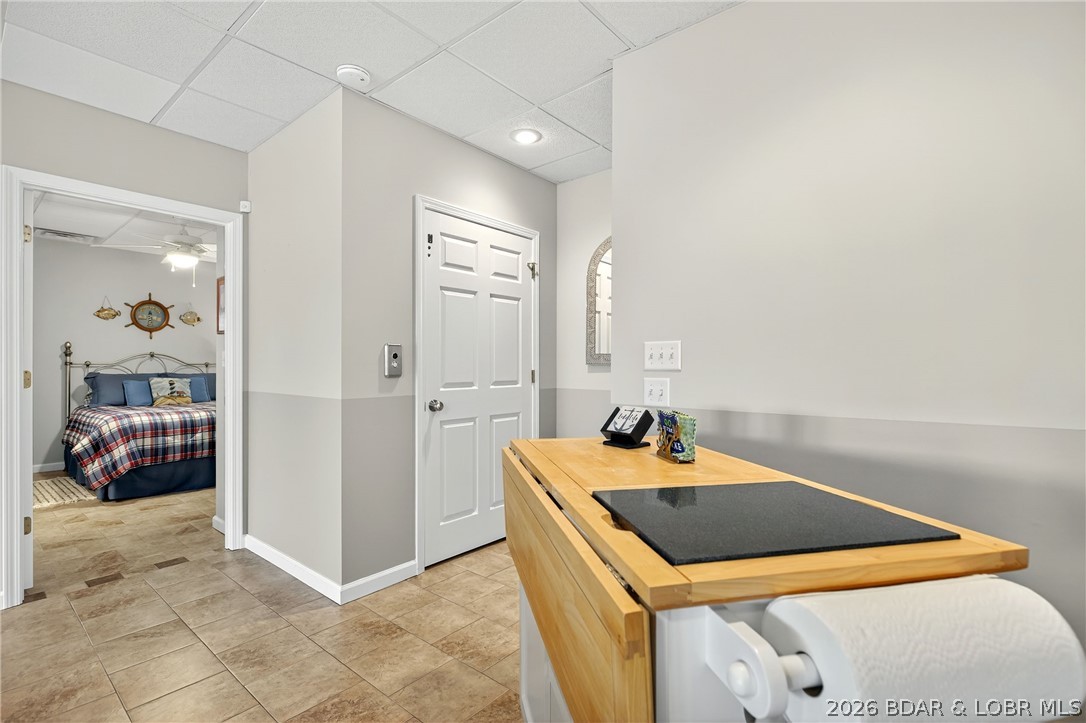 331 Hollow Oak Road Sunrise Beach, MO 65079 - Photo 52 of 66 Bedroom 3 w/ en-suite, elevator access