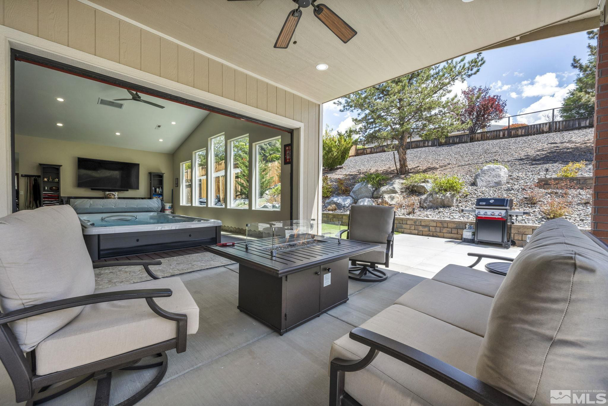 6015 Stillmeadow Drive Reno, NV 89502 - Photo 12 of 39 a living room with furniture and a large window