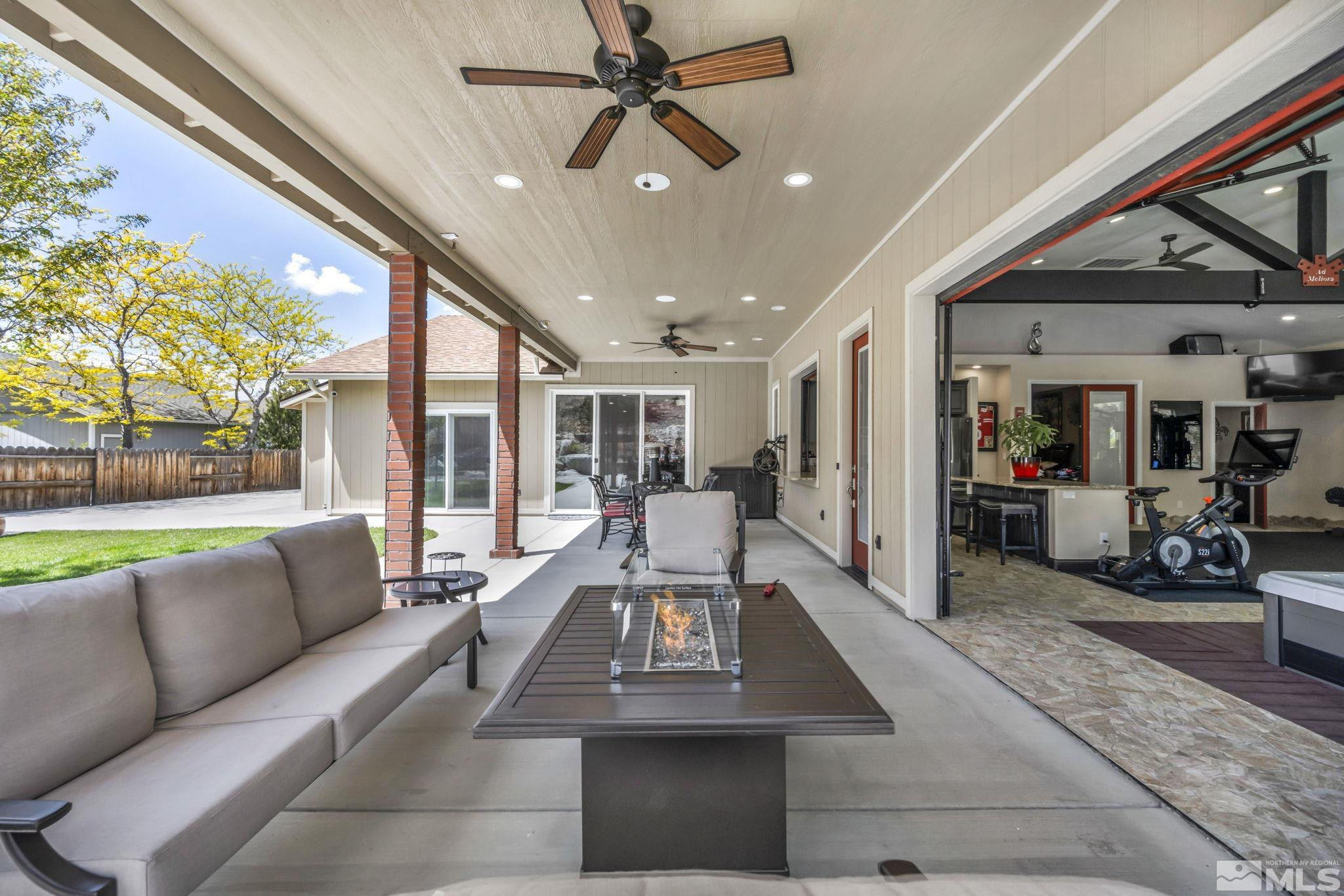 6015 Stillmeadow Drive Reno, NV 89502 - Photo 13 of 39 a living room with furniture and a large window