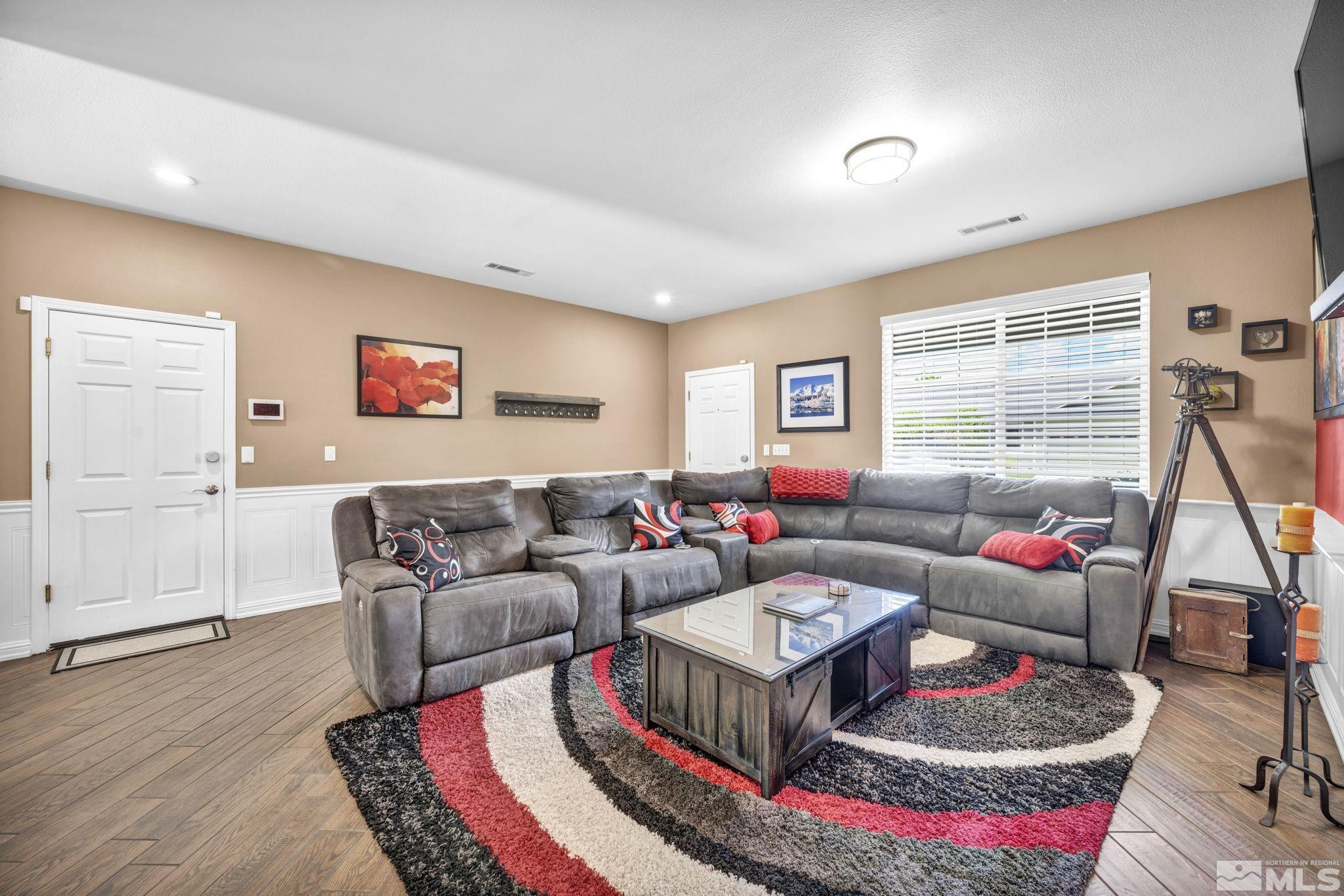 6015 Stillmeadow Drive Reno, NV 89502 - Photo 21 of 39 a living room with furniture and a window
