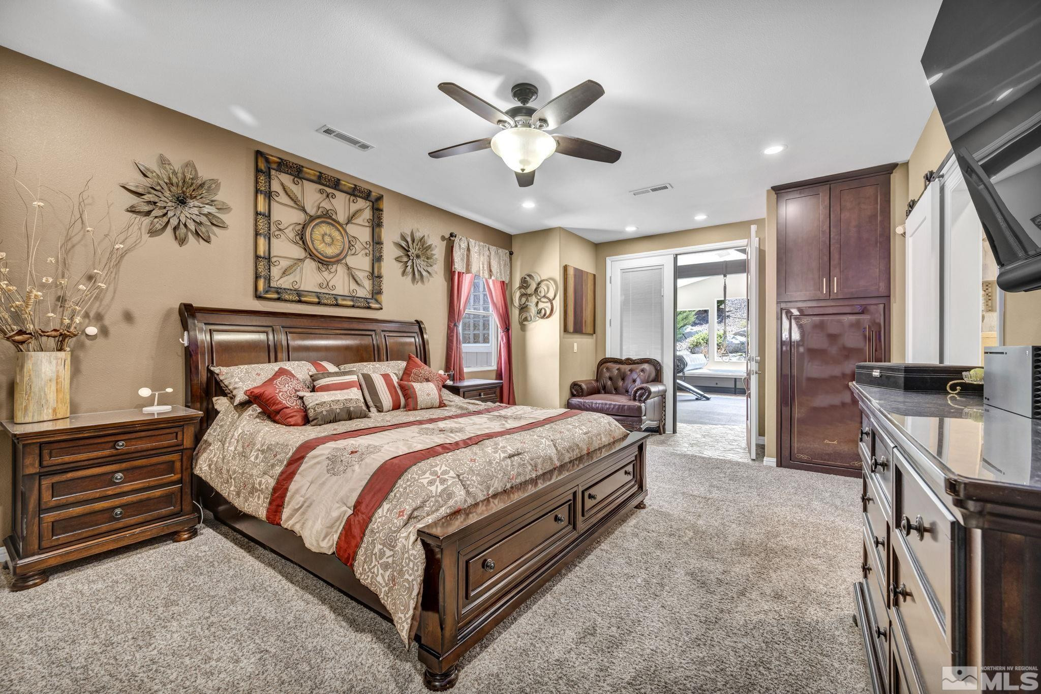6015 Stillmeadow Drive Reno, NV 89502 - Photo 23 of 39 a bed room with a bed and a large window
