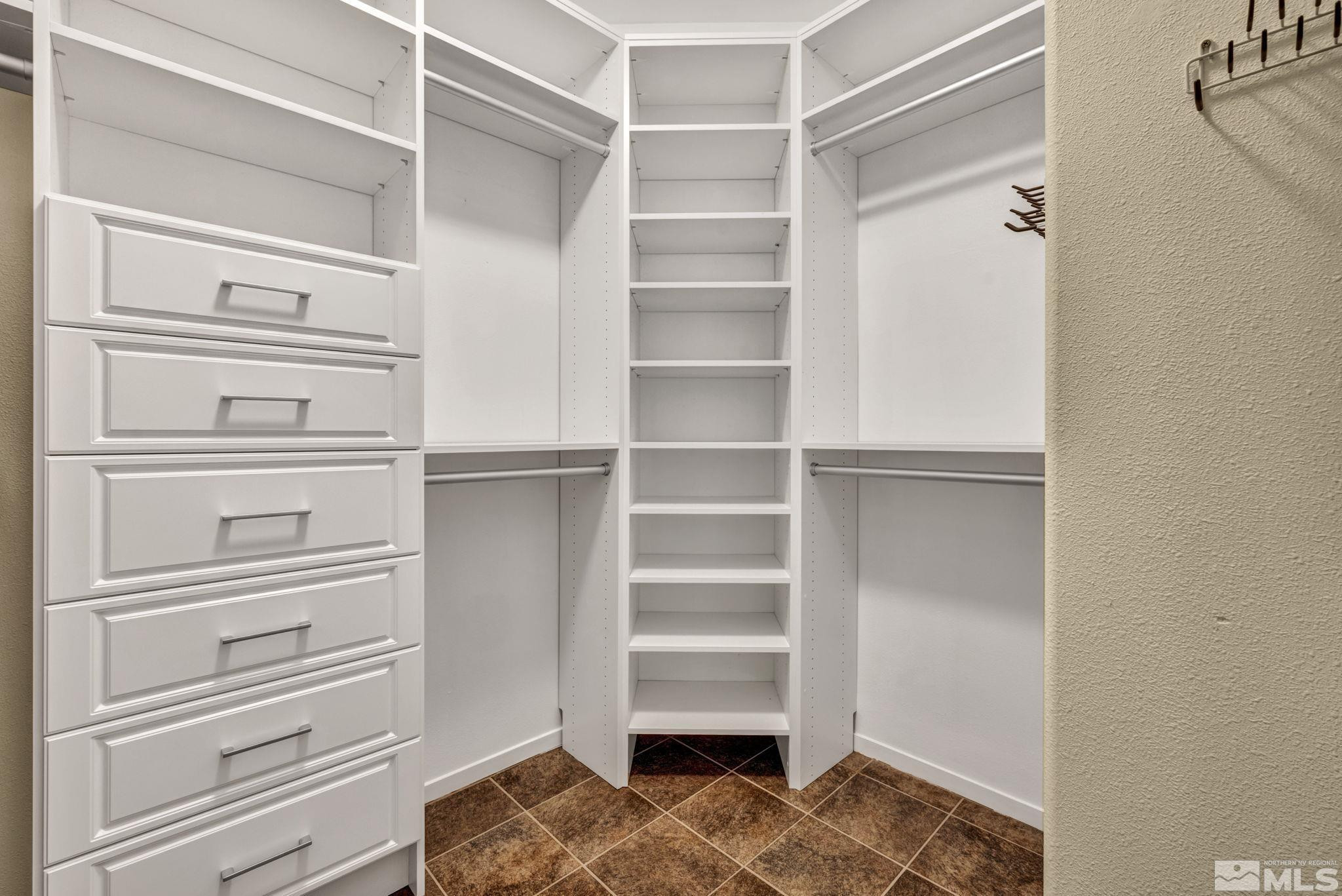 6015 Stillmeadow Drive Reno, NV 89502 - Photo 24 of 39 a view of walk in closet with empty racks