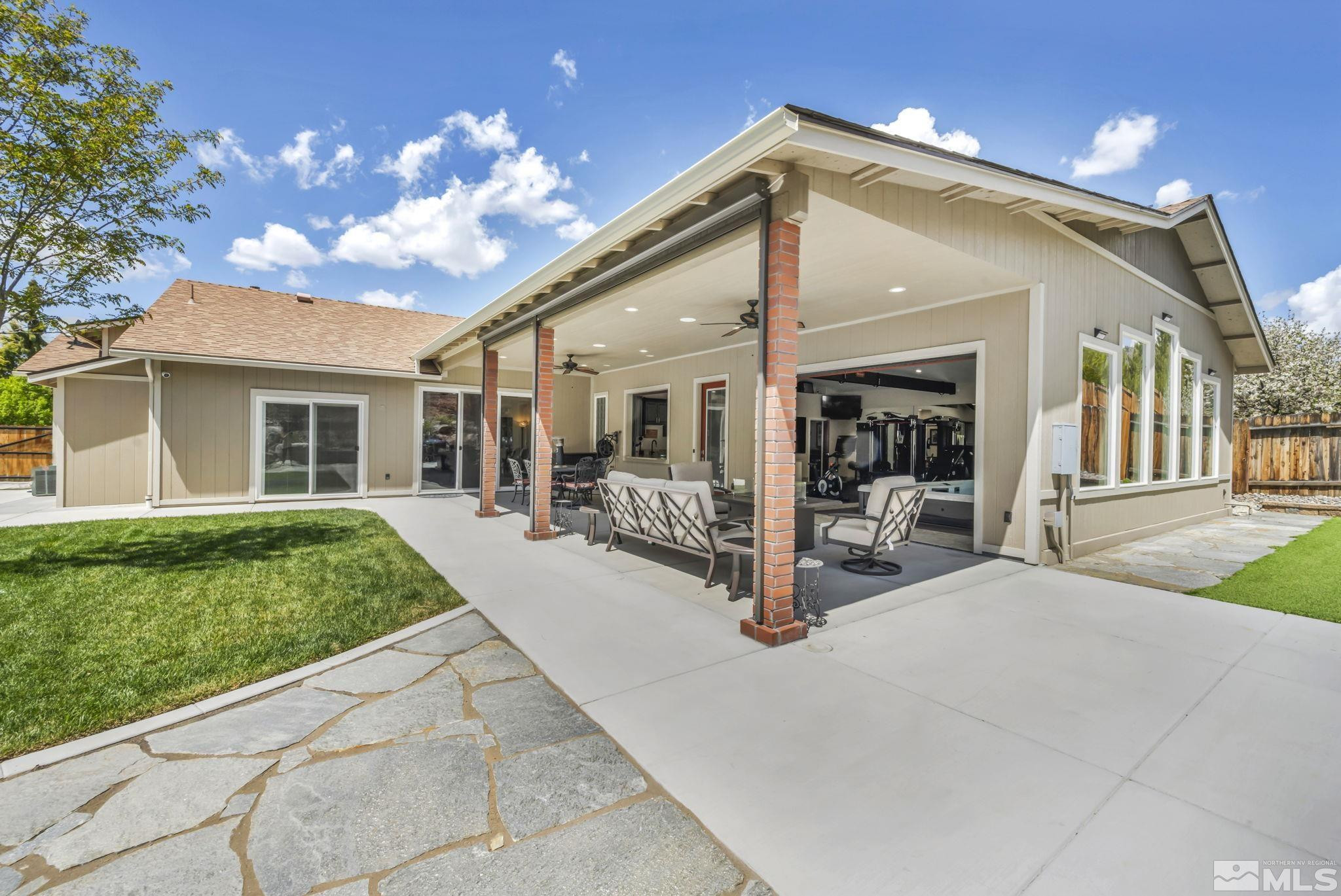 6015 Stillmeadow Drive Reno, NV 89502 - Photo 38 of 39 a view of a house with porch and sitting area