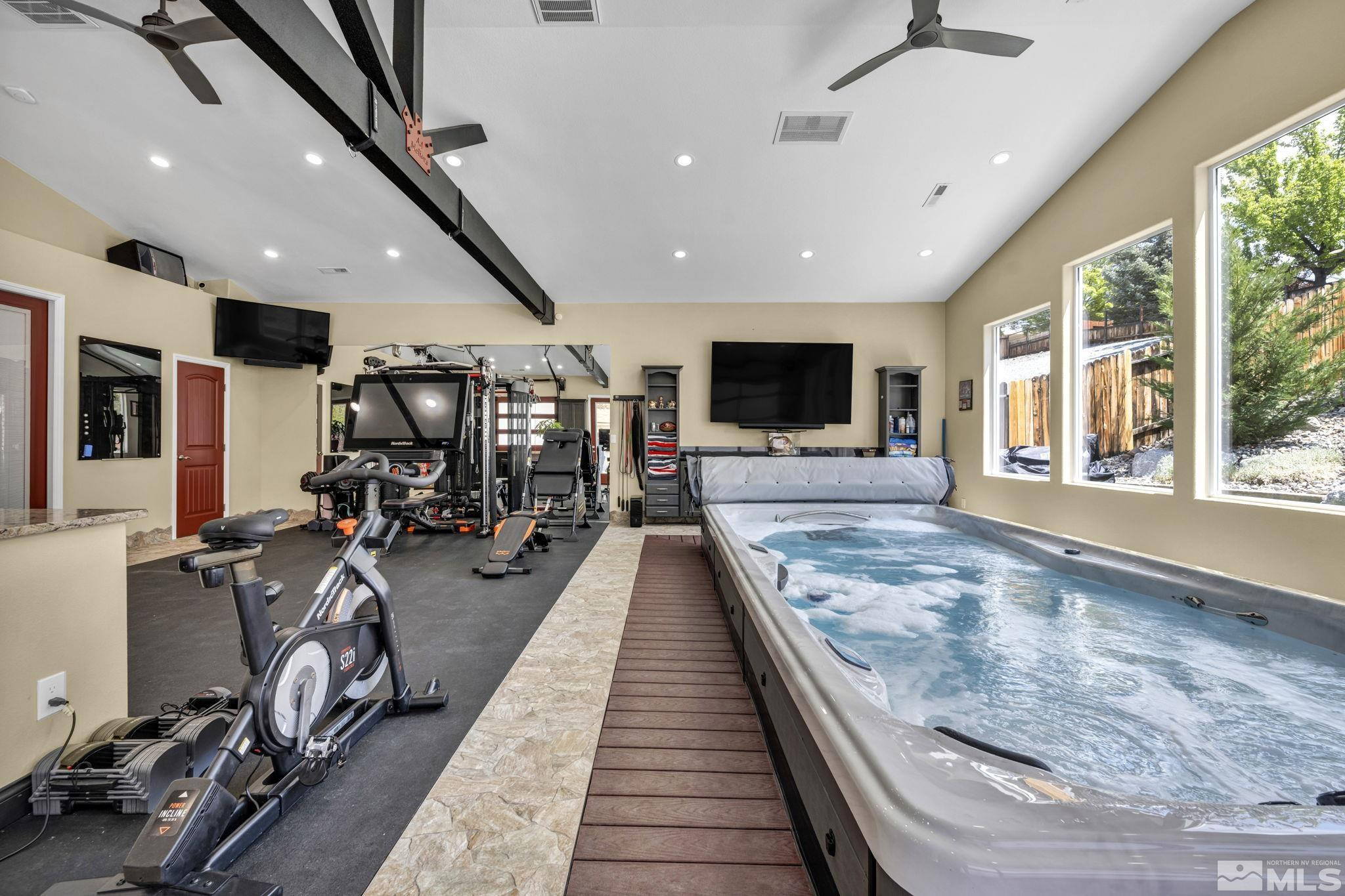 6015 Stillmeadow Drive Reno, NV 89502 - Photo 9 of 39 a view of a room with gym equipment