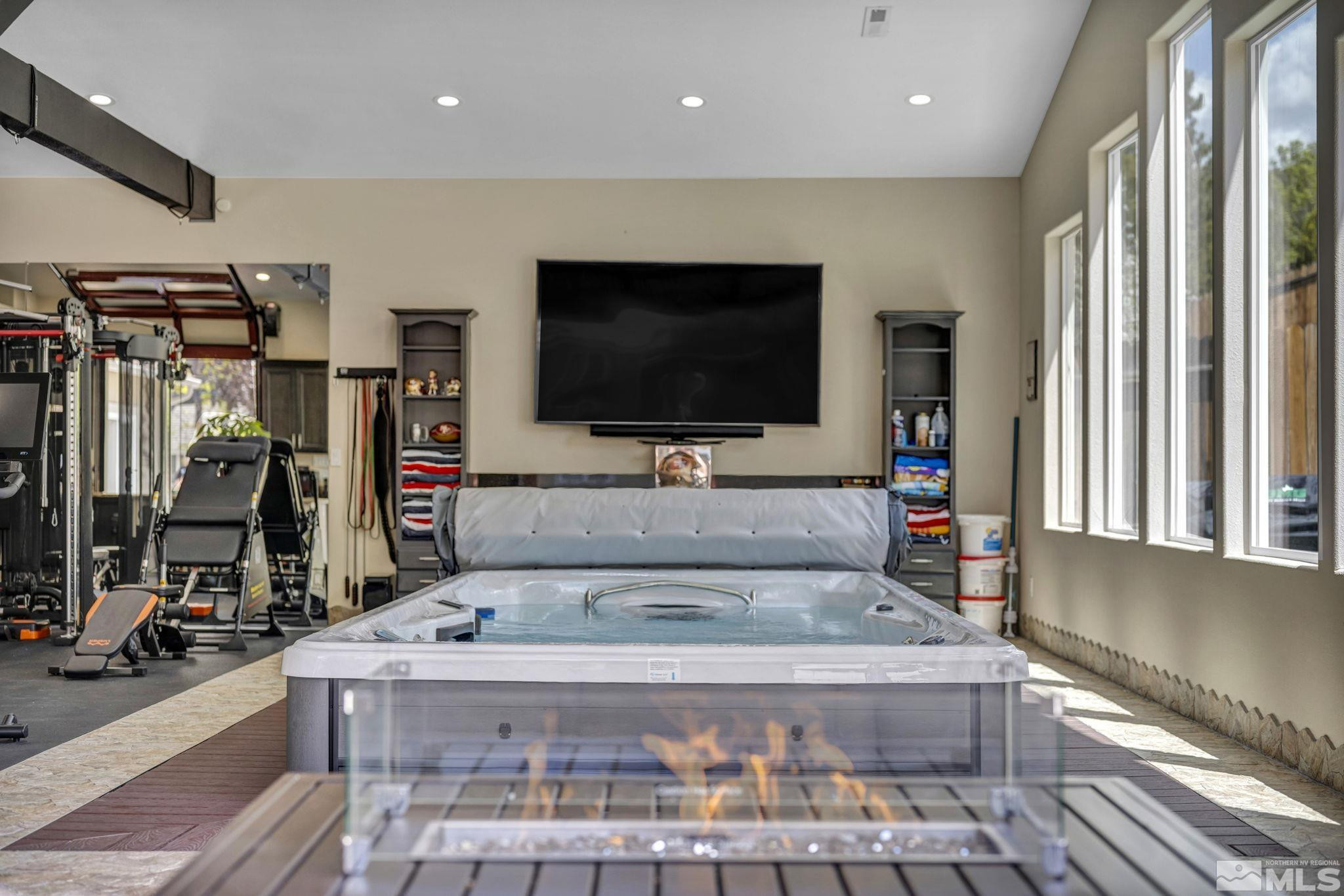 6015 Stillmeadow Drive Reno, NV 89502 - Photo 10 of 39 a view of a living room and a flat screen tv