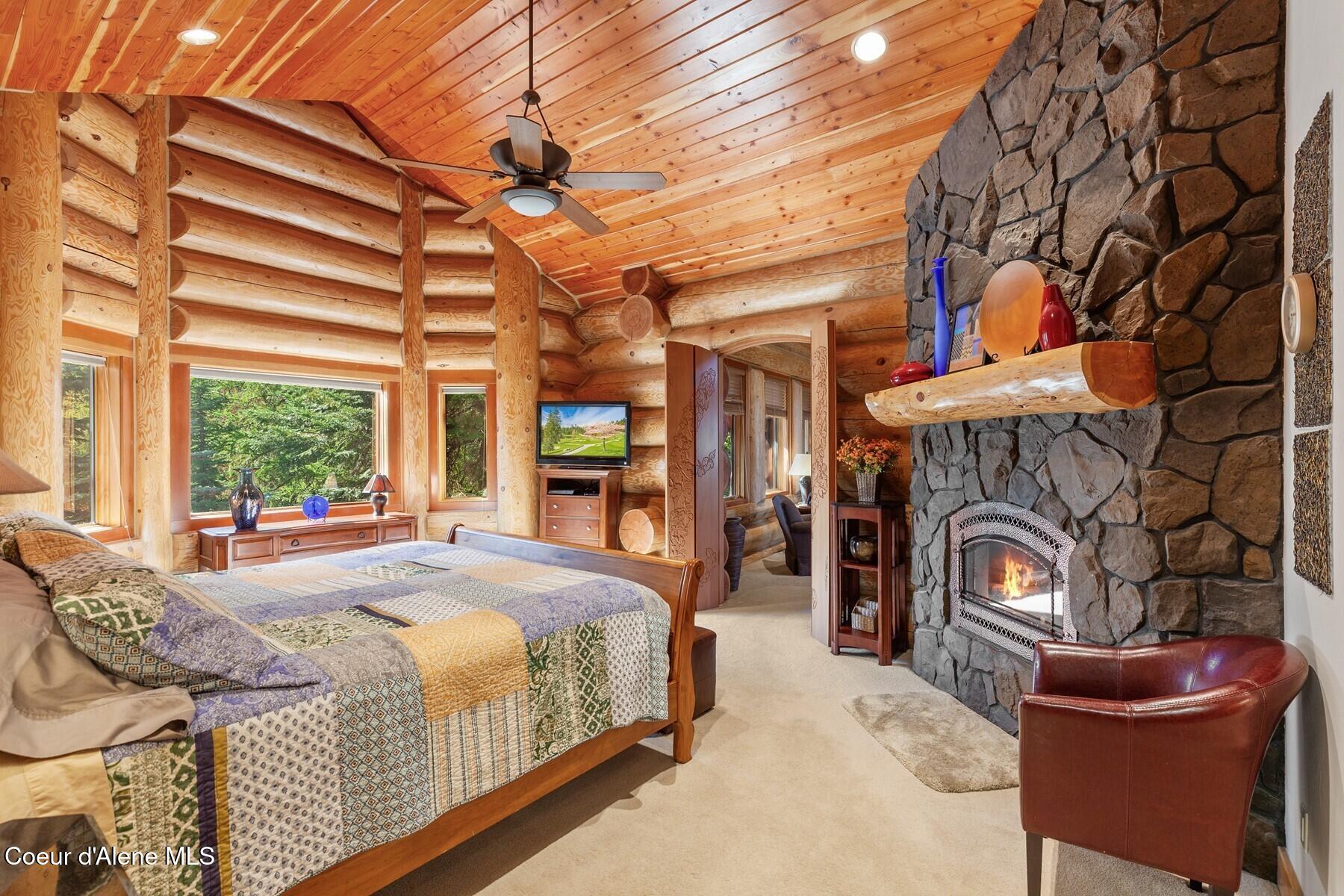 18869 South Trekker Woods Road Coeur D'Alene, ID 83814 - Photo 15 of 76 Primary BR wStone Fireplace