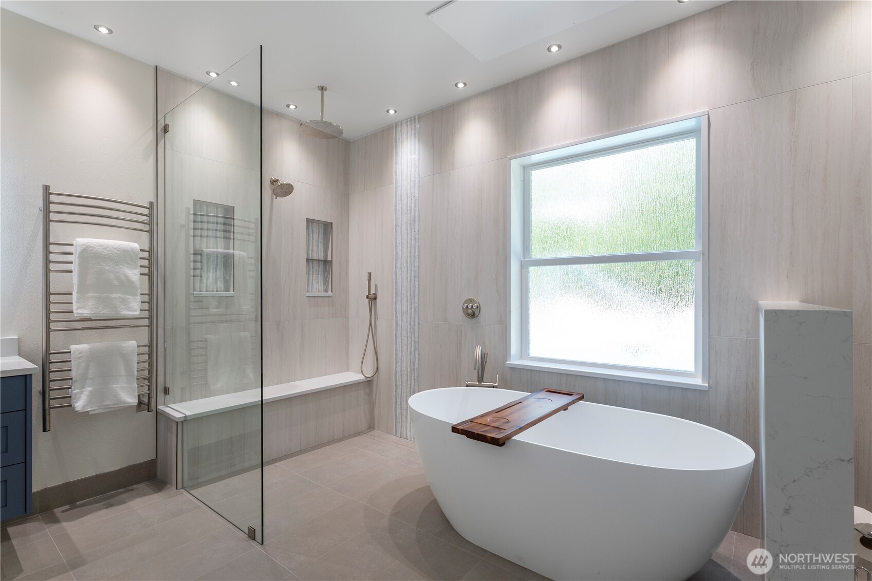 6068 East Hemmi Road Bellingham, WA 98226 - Photo 17 of 40 a bathroom with a tub and shower