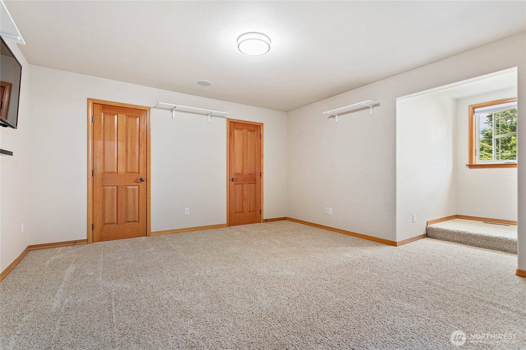 6068 East Hemmi Road Bellingham, WA 98226 - Photo 21 of 40 a view of an empty room and a window