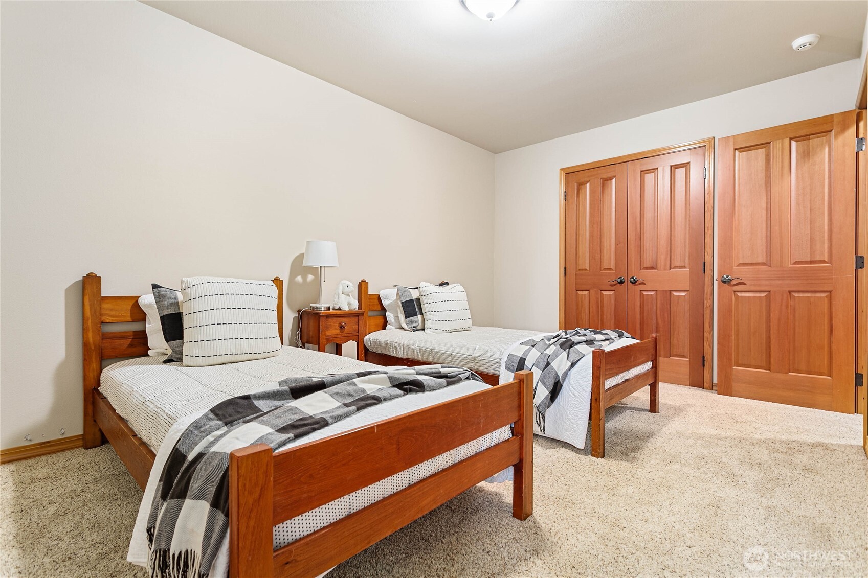 6068 East Hemmi Road Bellingham, WA 98226 - Photo 22 of 40 a bedroom with a bed and a window