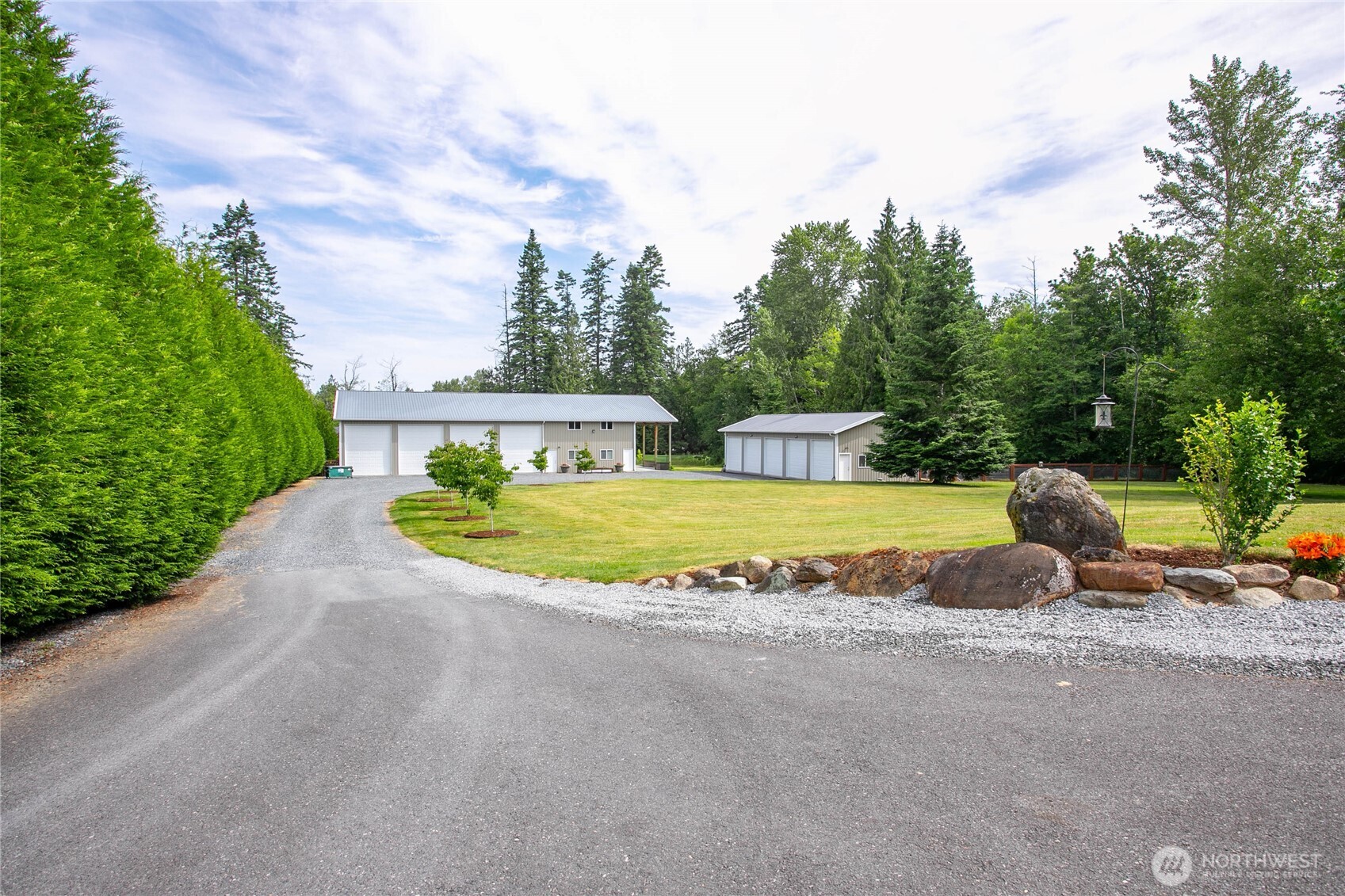 6068 East Hemmi Road Bellingham, WA 98226 - Photo 31 of 40 a view of a swimming pool with a lounge chair