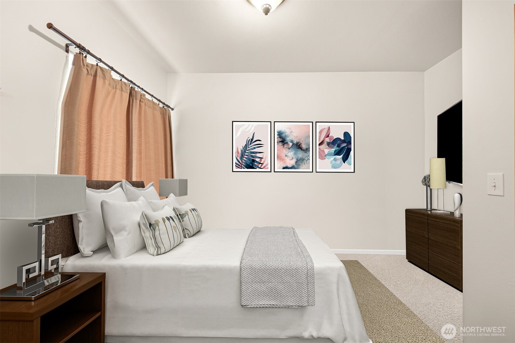 6068 East Hemmi Road Bellingham, WA 98226 - Photo 37 of 40 a bedroom with a bed and a flat screen tv