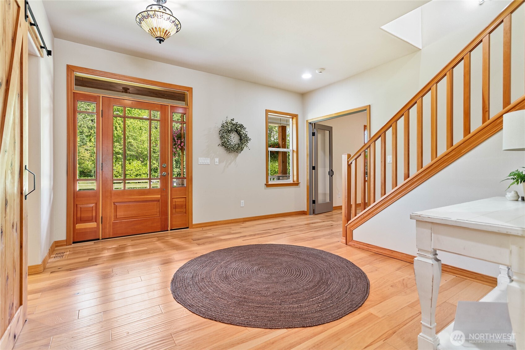 6068 East Hemmi Road Bellingham, WA 98226 - Photo 6 of 40 a view of an entryway with wooden floor