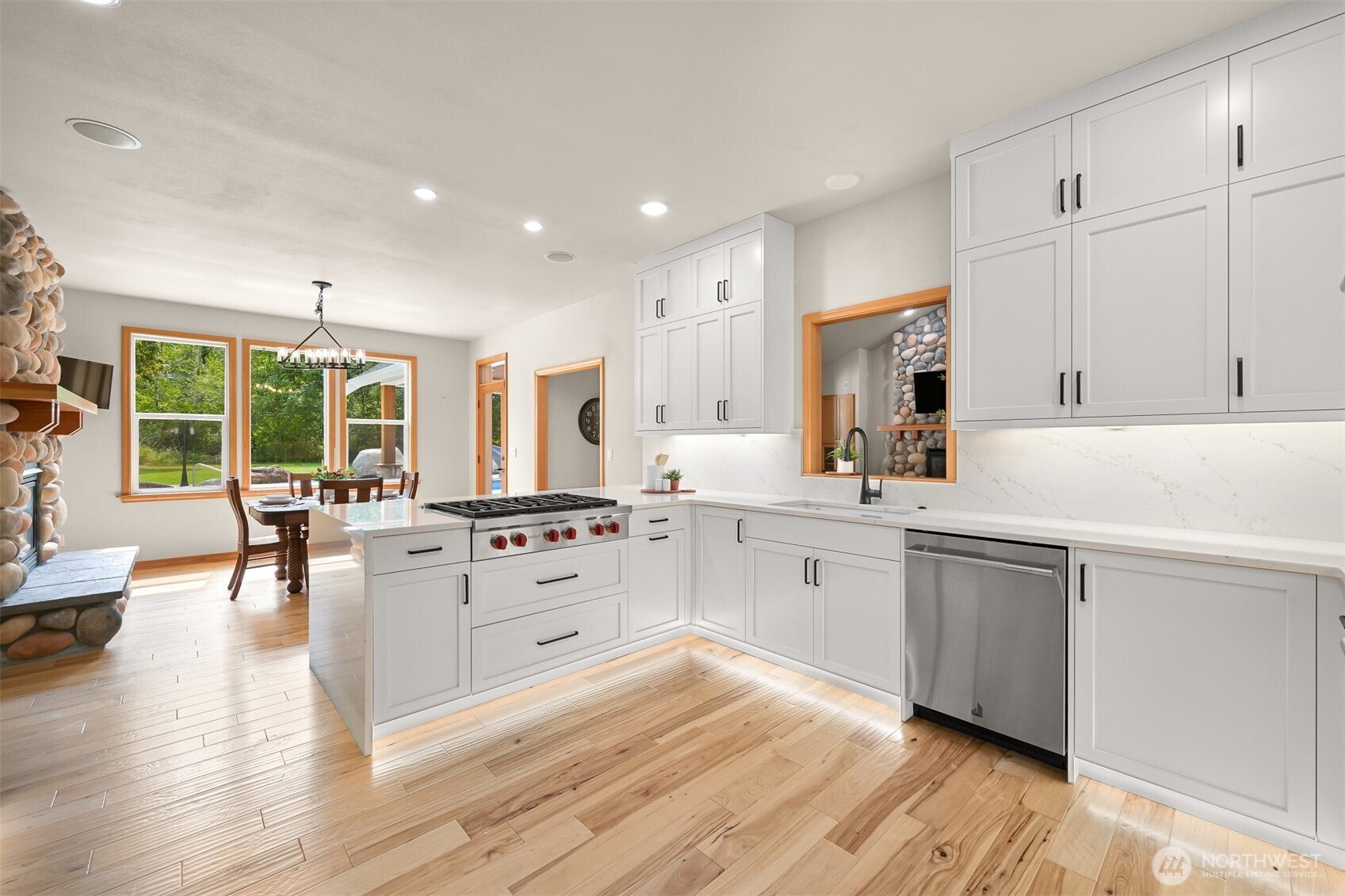6068 East Hemmi Road Bellingham, WA 98226 - Photo 10 of 40 a kitchen with white cabinets and white appliances