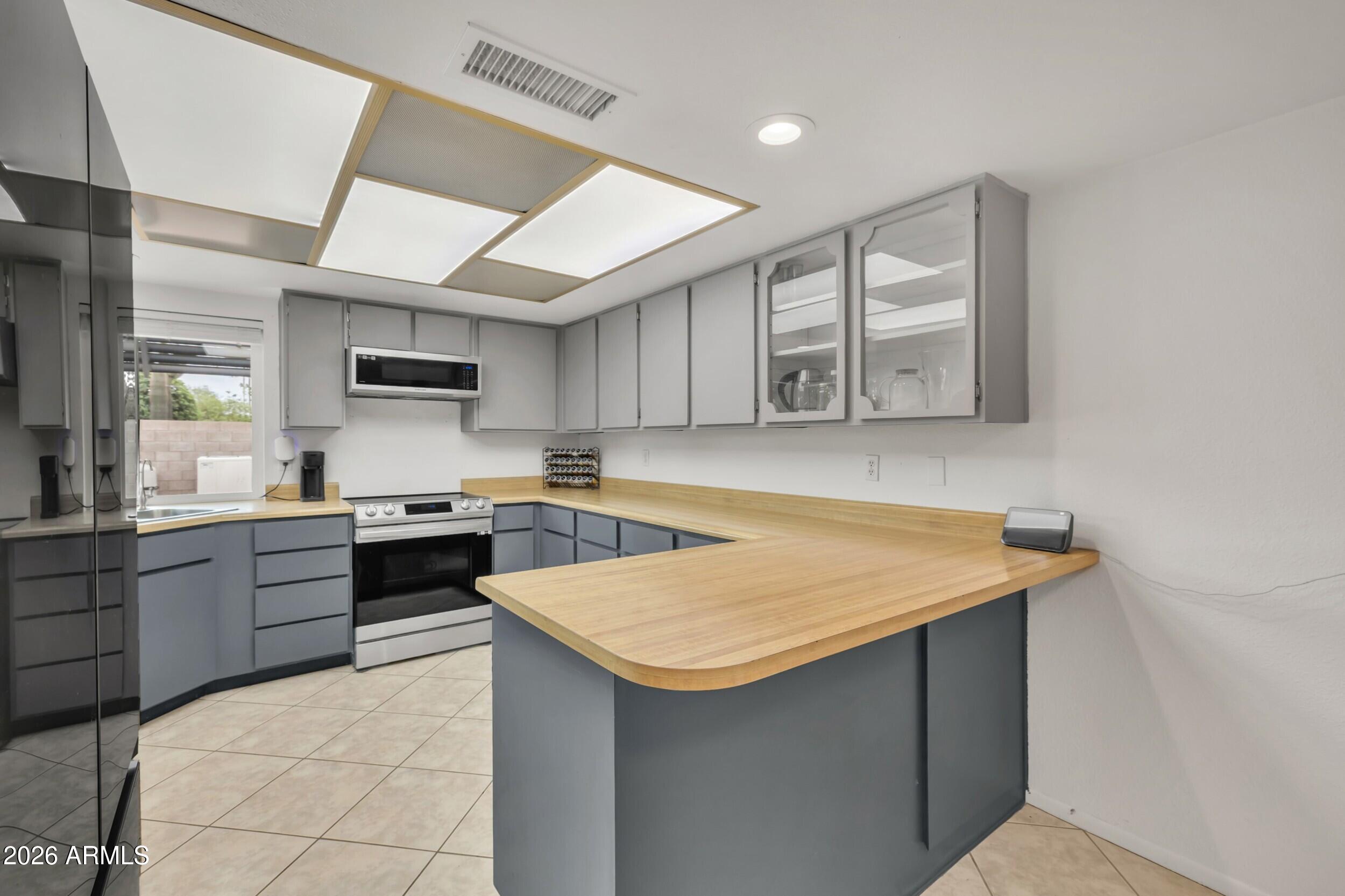 3833 West Phelps Road Phoenix, AZ 85053 - Photo 3 of 55 Large Kitchen