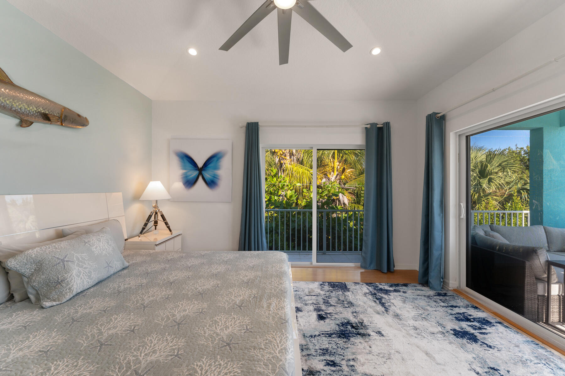 189 Carroll Street Islamorada, FL 33036 - Photo 19 of 37 a bedroom with furniture and a large window