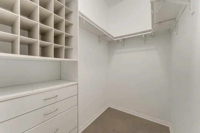 a view of an empty walk in closet