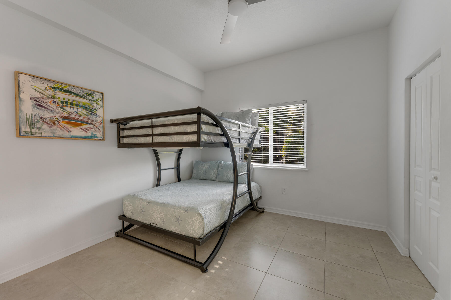 189 Carroll Street Islamorada, FL 33036 - Photo 24 of 37 a bedroom with a bed and a window