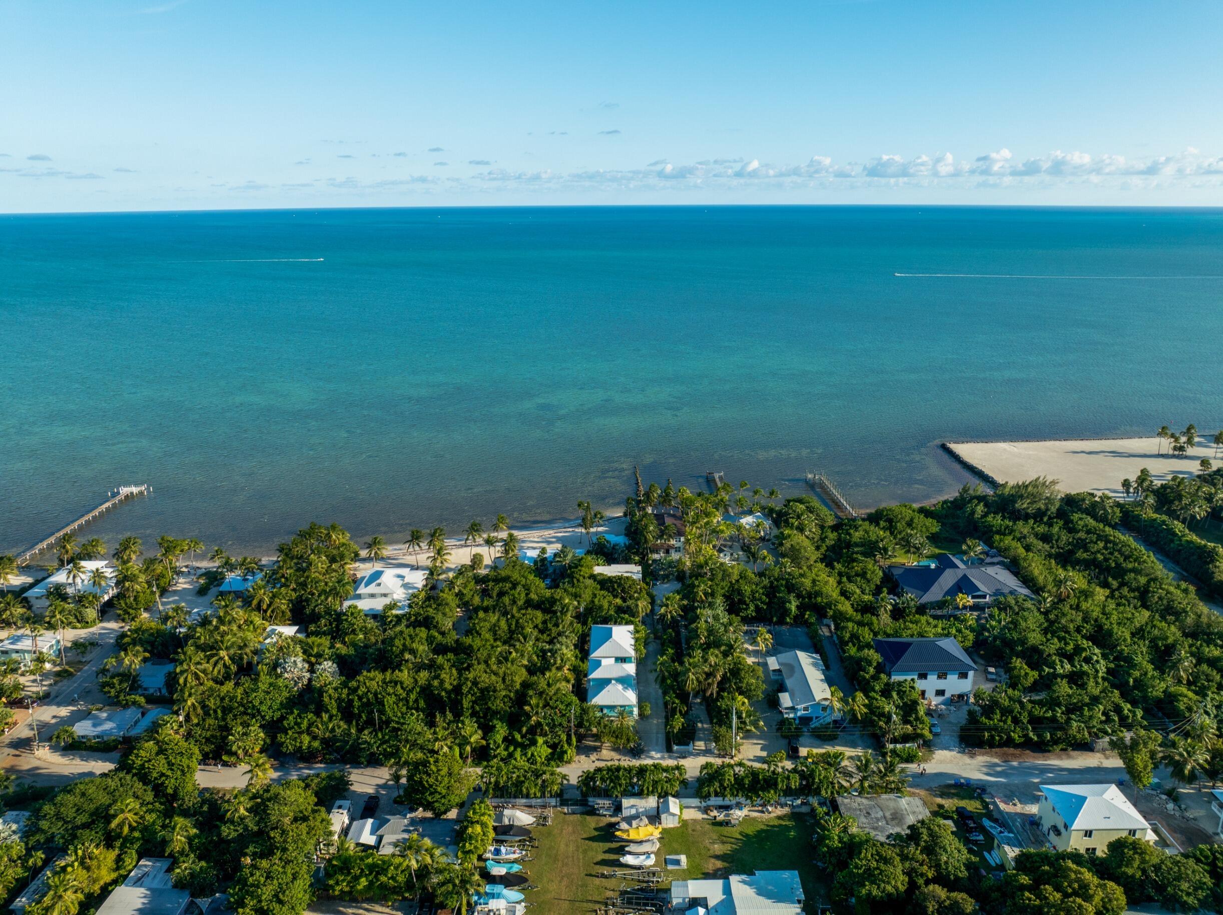189 Carroll Street Islamorada, FL 33036 - Photo 34 of 37 a view of a lake with a building in the background