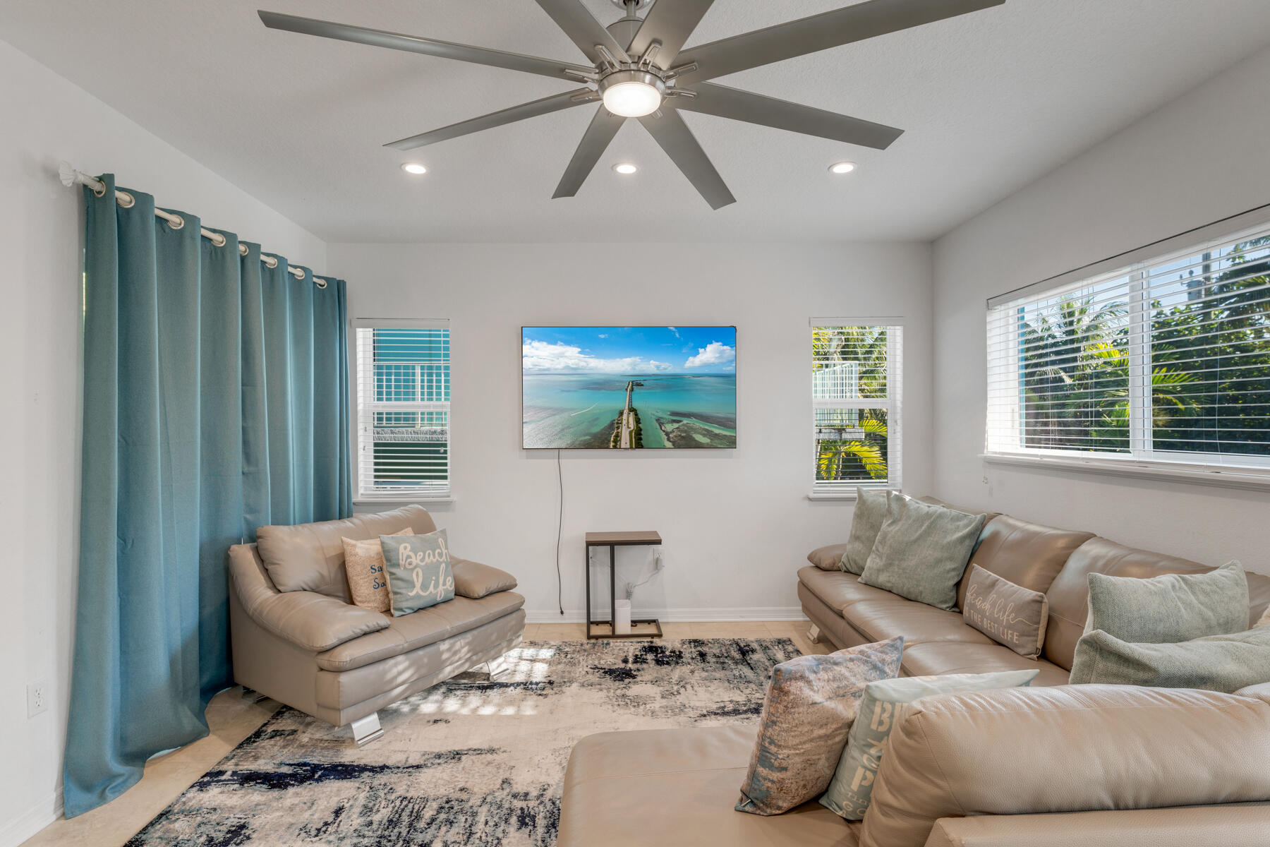 189 Carroll Street Islamorada, FL 33036 - Photo 8 of 37 a living room with furniture and a large window