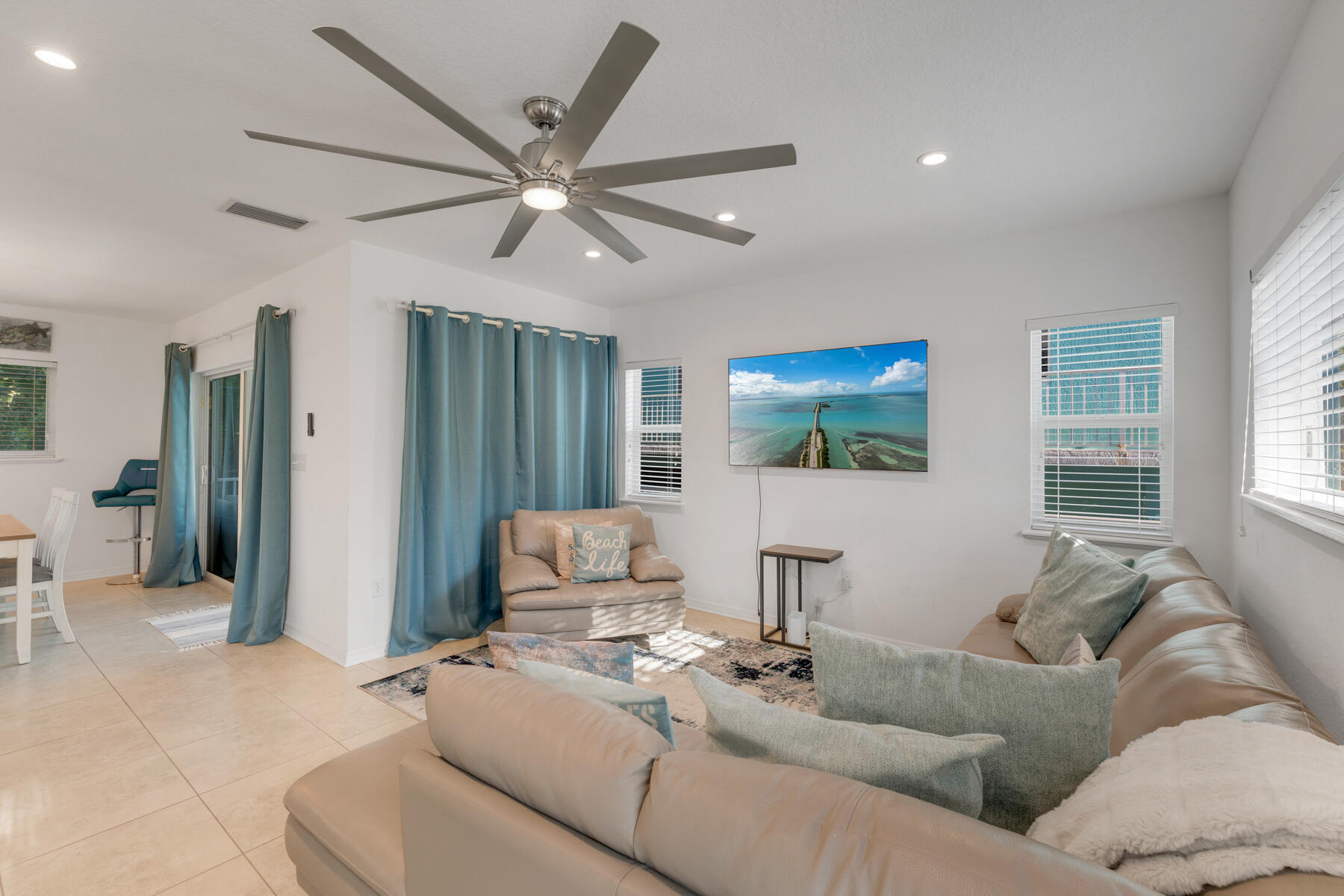 189 Carroll Street Islamorada, FL 33036 - Photo 10 of 37 a living room with furniture and a window