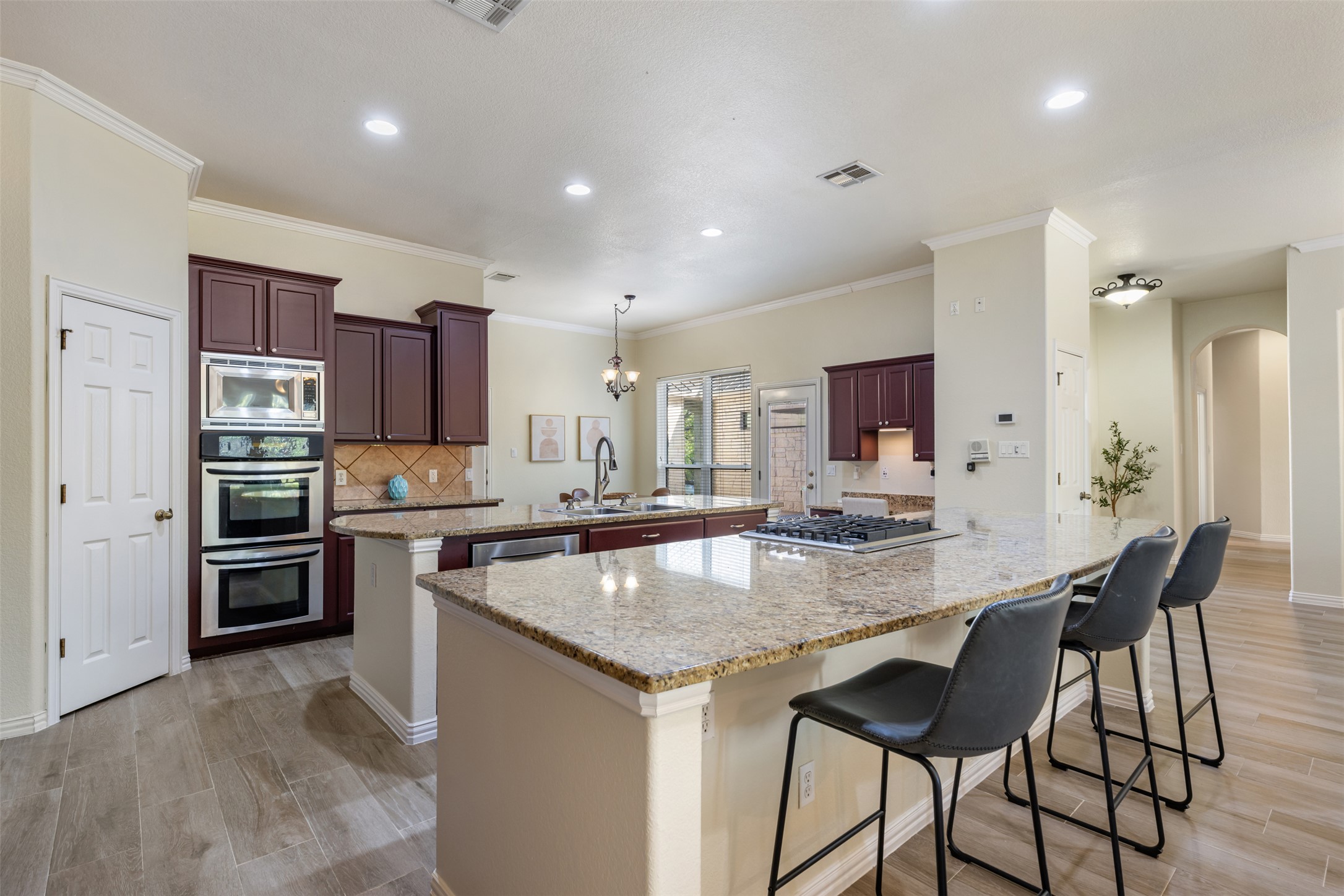 181 Whitney Run Buda, TX 78610 - Photo 16 of 40 Double ovens & large breakfast bar.