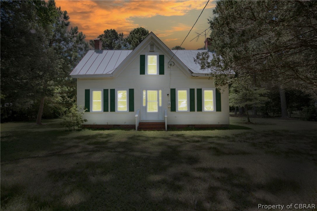 2442 Old Ferry Road Hudgins, VA 23076 - Photo 3 of 33 View of front of house featuring a lawn