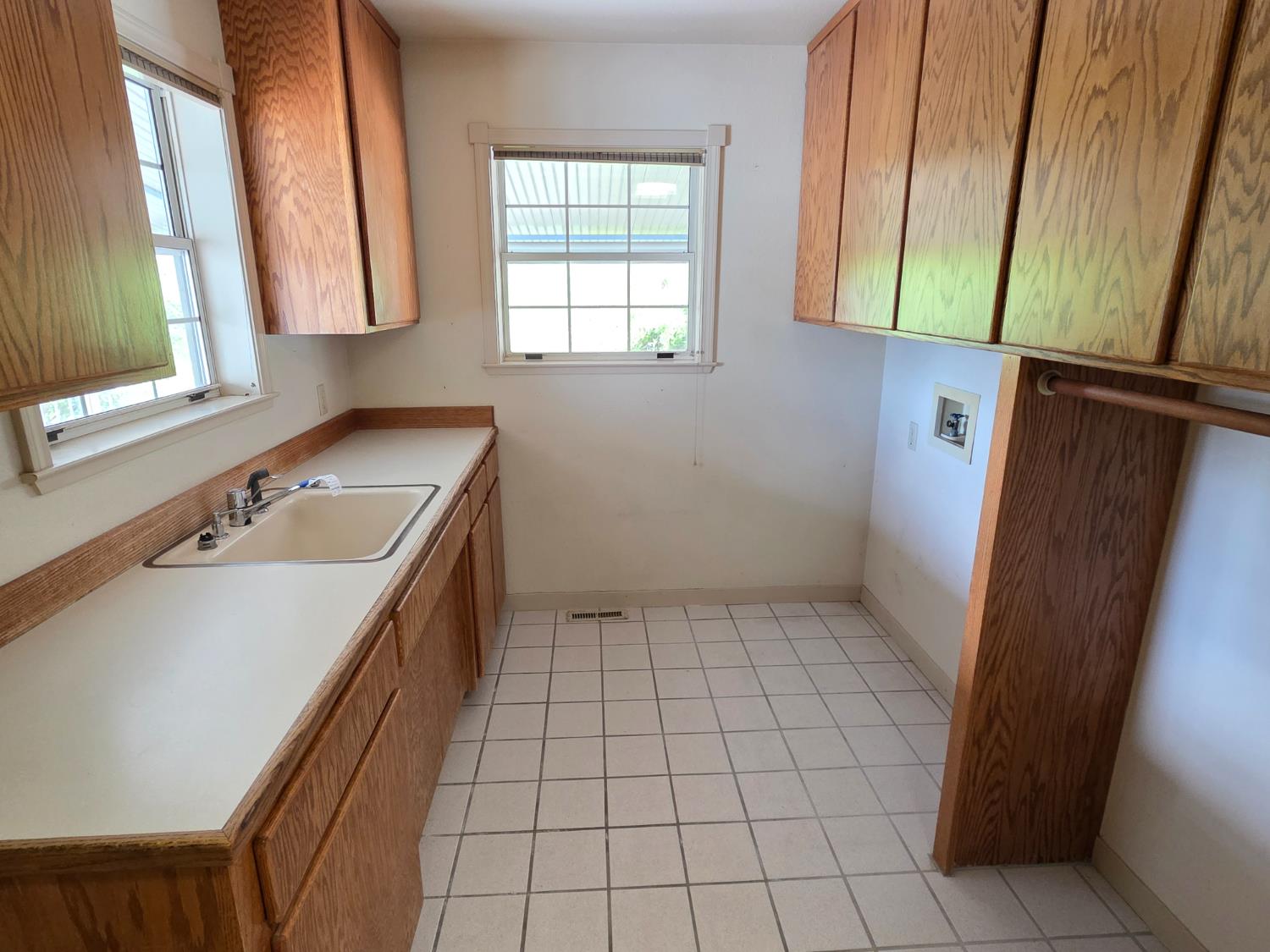 6416 Rio Blanco Drive Rancho Murieta, CA 95683 - Photo 16 of 70 Note the Laundry Area has a sink, lots of counter space and even a clothes bar.