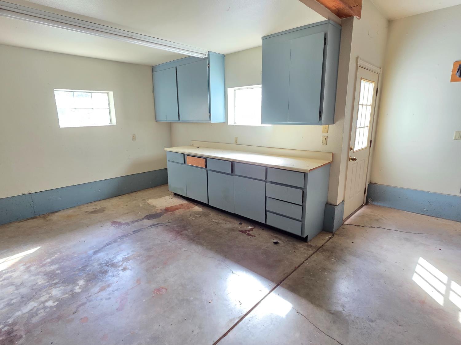6416 Rio Blanco Drive Rancho Murieta, CA 95683 - Photo 20 of 70 Storage cabinerts and access door to the side yard.