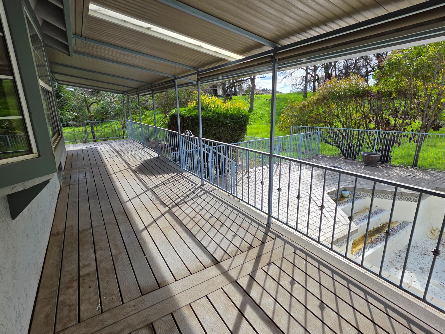 6416 Rio Blanco Drive Rancho Murieta, CA 95683 - Photo 48 of 70 Lots of entertaining space on this nice deck that overlooks the pool and relaxing backyard area.