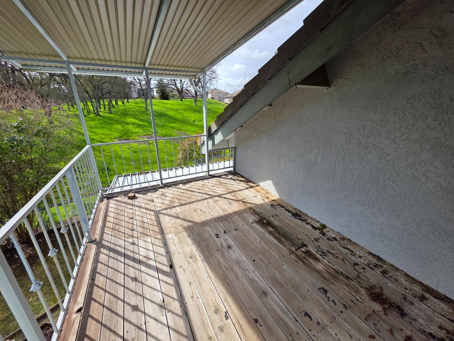 6416 Rio Blanco Drive Rancho Murieta, CA 95683 - Photo 52 of 70 Covered wrap around deck on the side of house.
