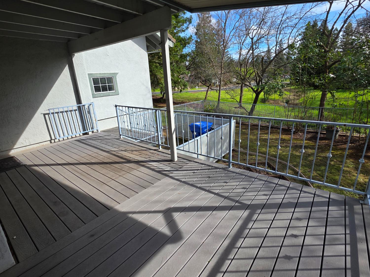 6416 Rio Blanco Drive Rancho Murieta, CA 95683 - Photo 53 of 70 The wrap around deck has convenient steps down to the sideyard.