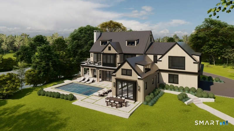 259 Frogtown Road New Canaan, CT 06840 - Photo 2 of 39 a front view of a house with a yard