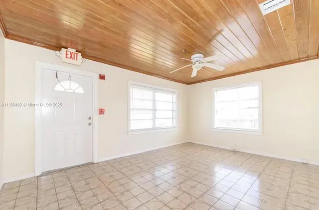 an empty room with windows