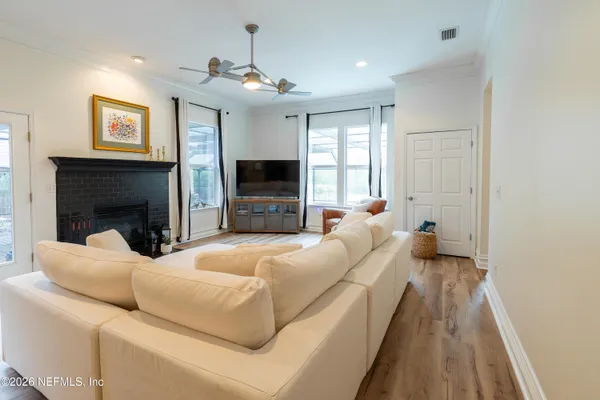 a kitchen with stainless steel appliances kitchen island granite countertop a stove and cabinets