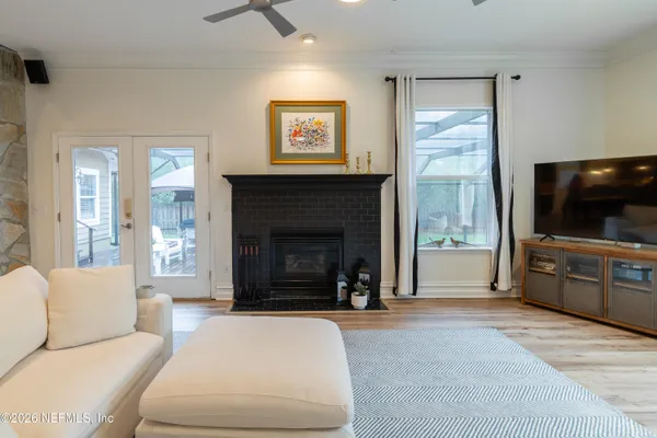 a kitchen with stainless steel appliances granite countertop a sink and dishwasher a stove with wooden floor