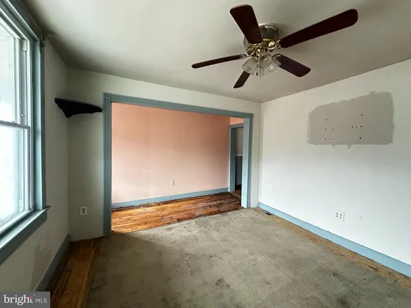 a view of a livingroom with a window